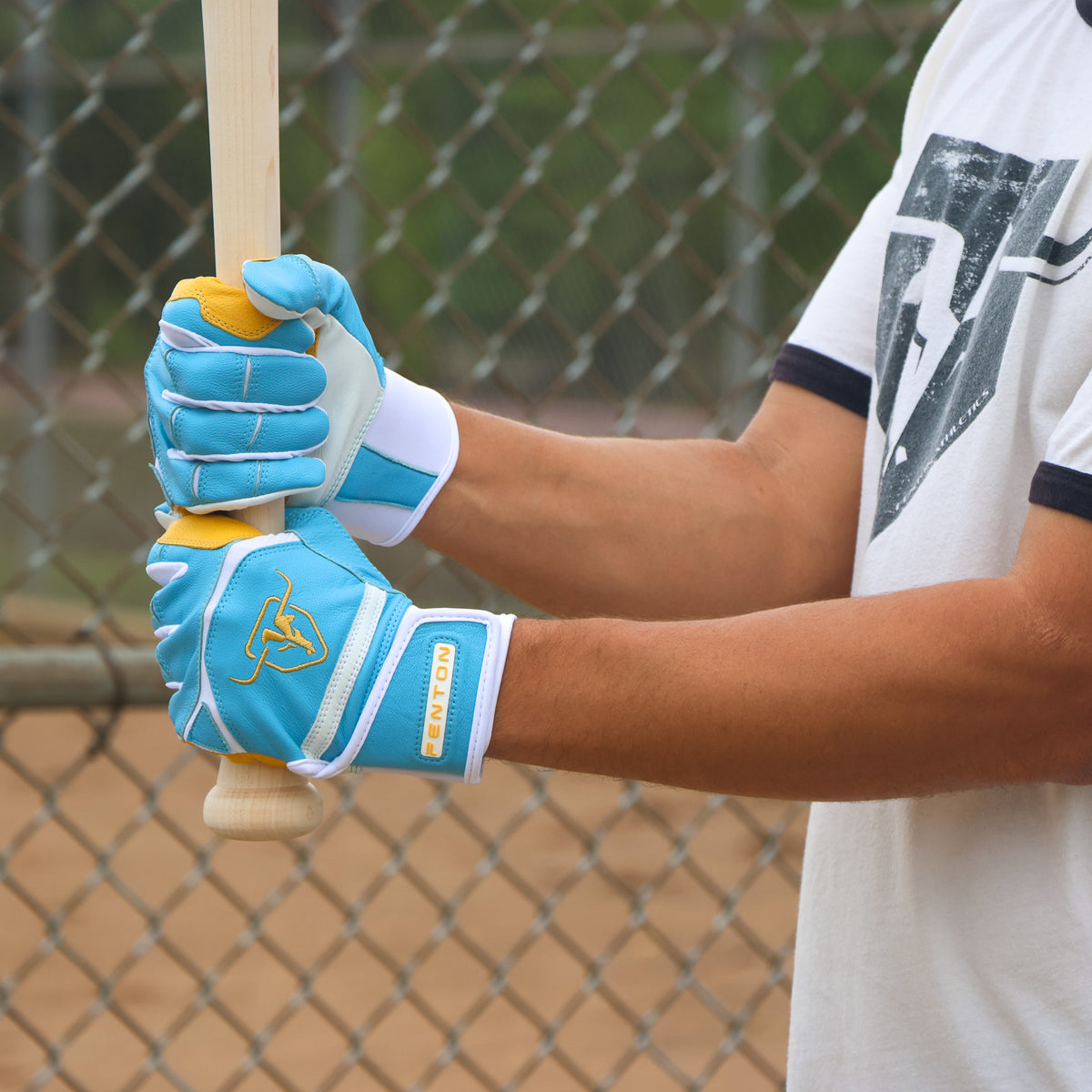 Baseball player holding a bat wearing Westwood batting gloves